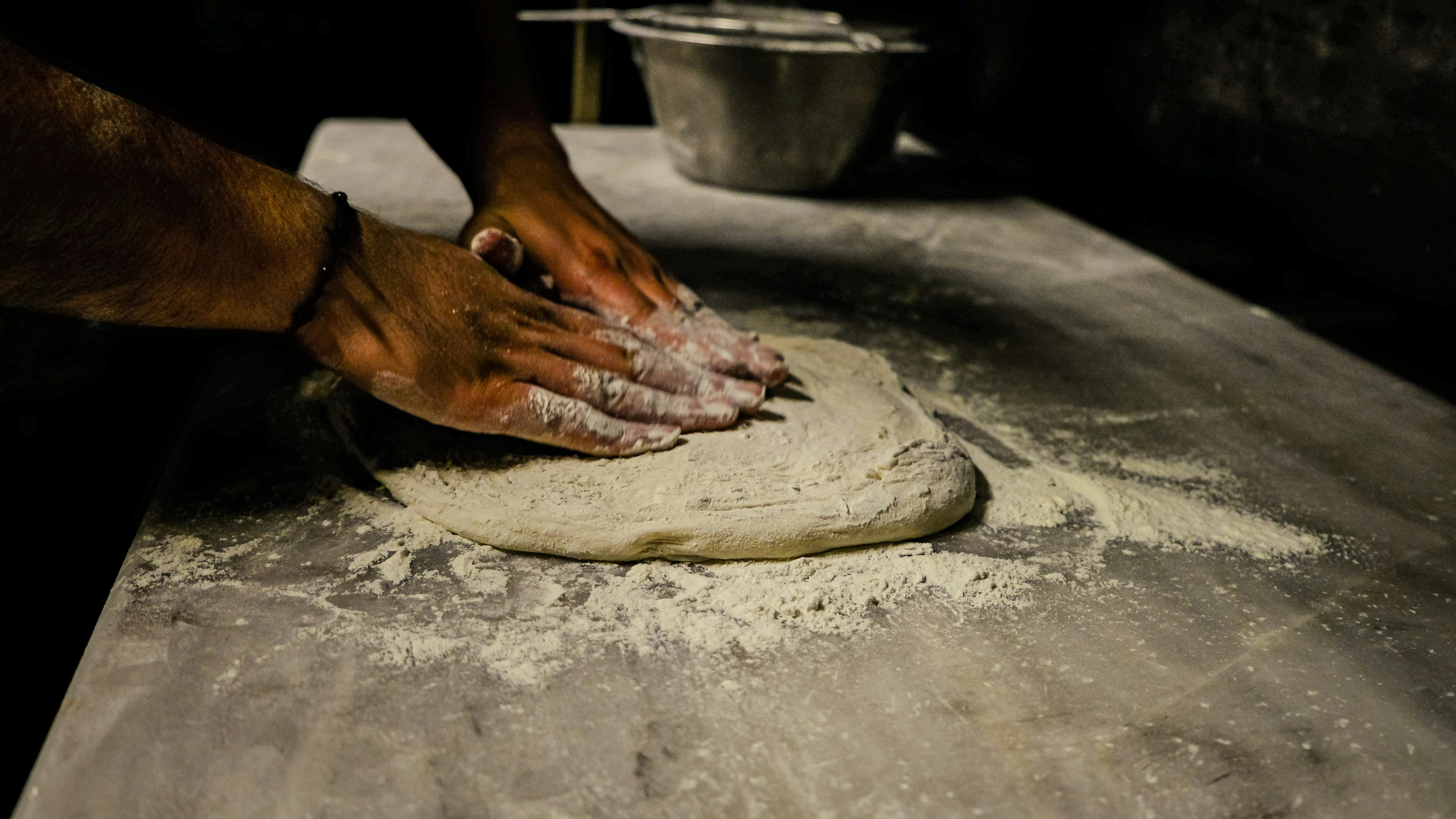 Handcrafted pizza being made